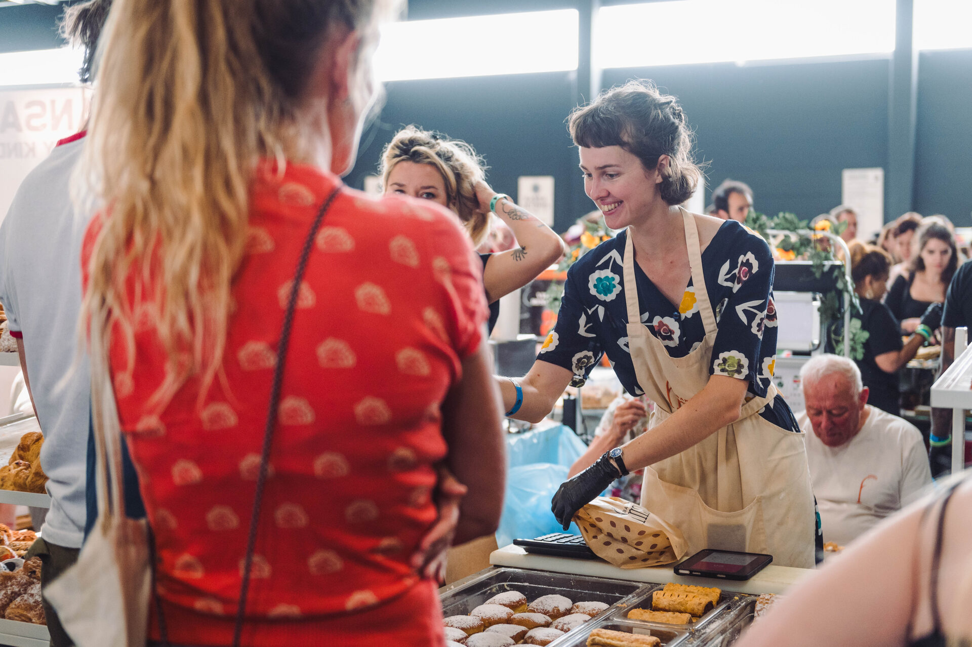 Vegan Summer Fest — a vendor serving fresh vegan baked goods at their stall